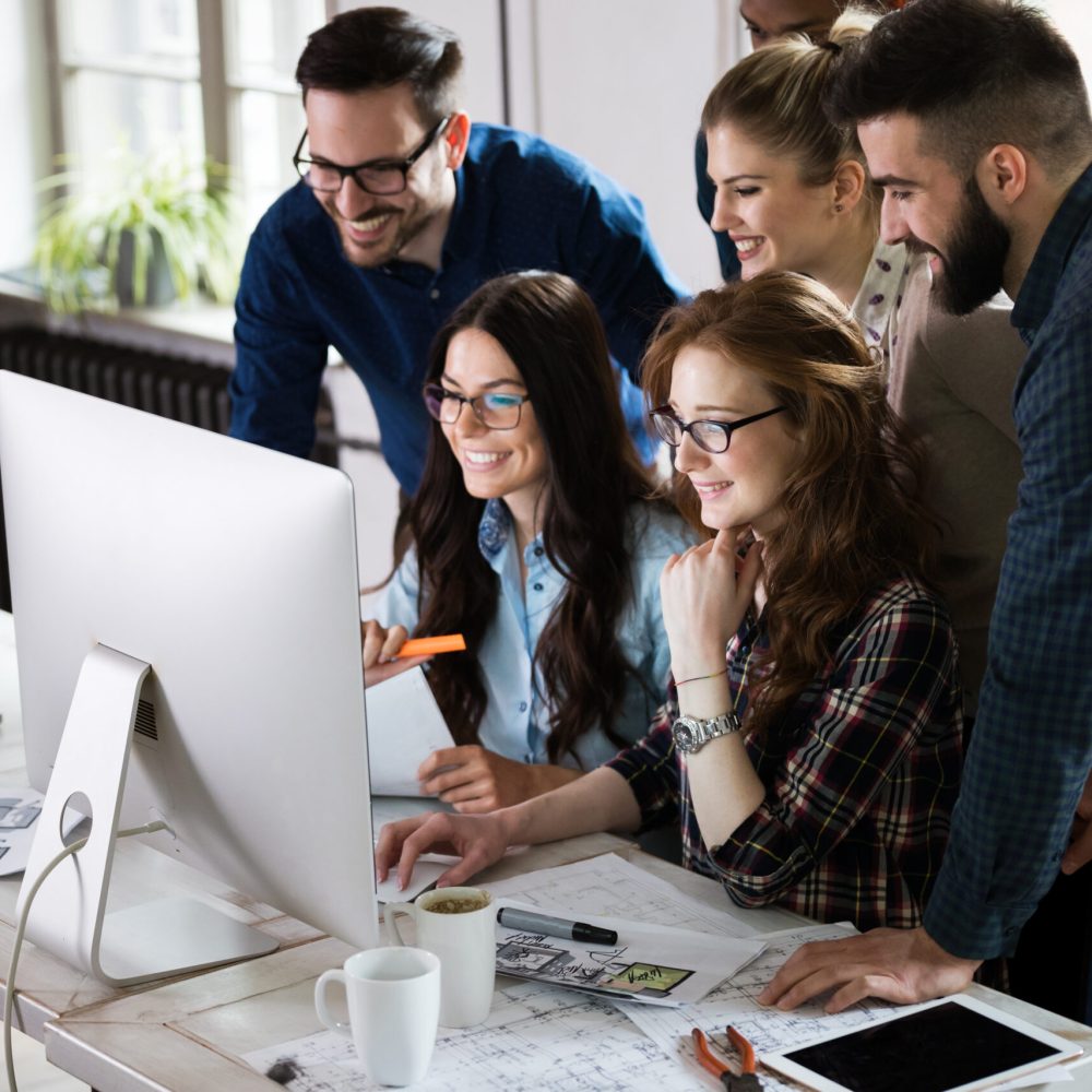 Young  IT team working on project in office together